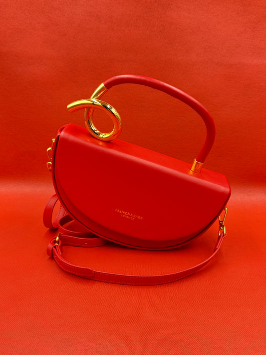 Modern Half-Moon Saddle Bag with Sculptural Gold Knot Handle & Crossbody Strap