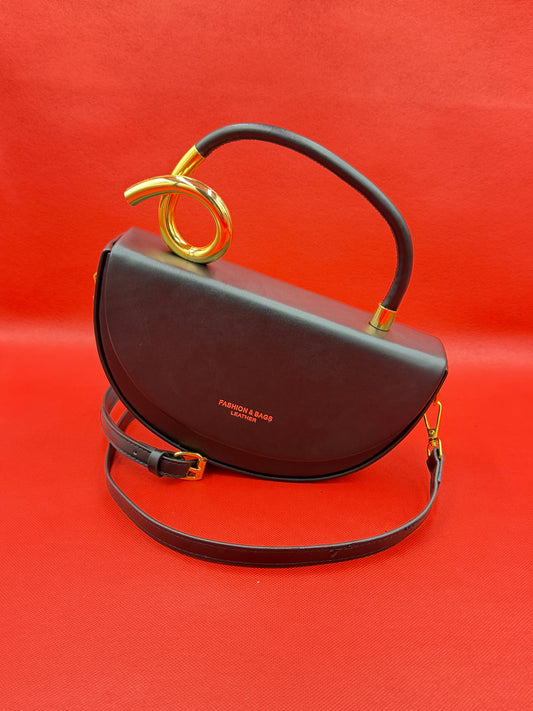 Modern Half-Moon Saddle Bag with Sculptural Gold Knot Handle & Crossbody Strap