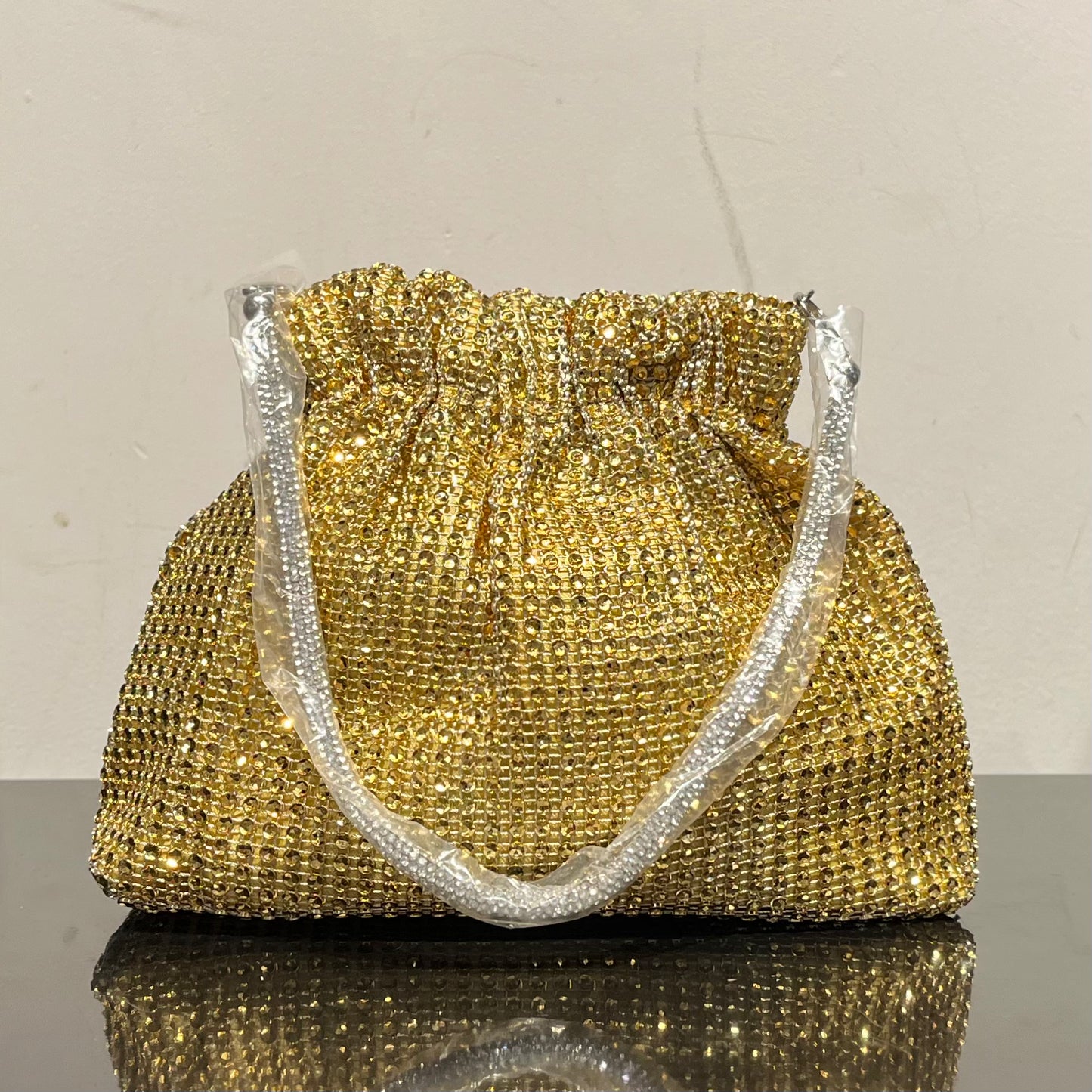 Studded Metallic Sack Clutch